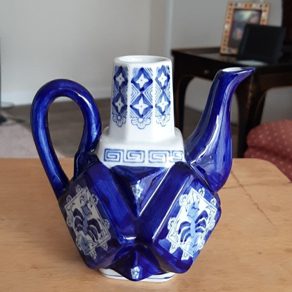 Vintage small blue and white oriental tea pot.